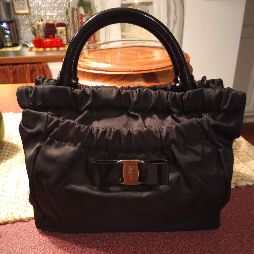 (SOLD)Salvatore Ferragamo Vera Bow Handbag in Black Nylon/Patent Leather Trim